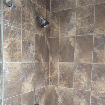 Complete Tub Installation with Faucet and Tile Work